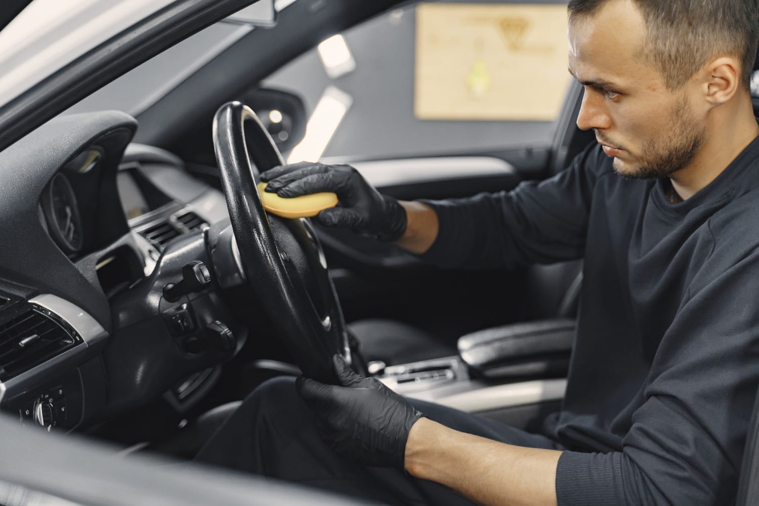 man-polish-salon-car-garage.jpg